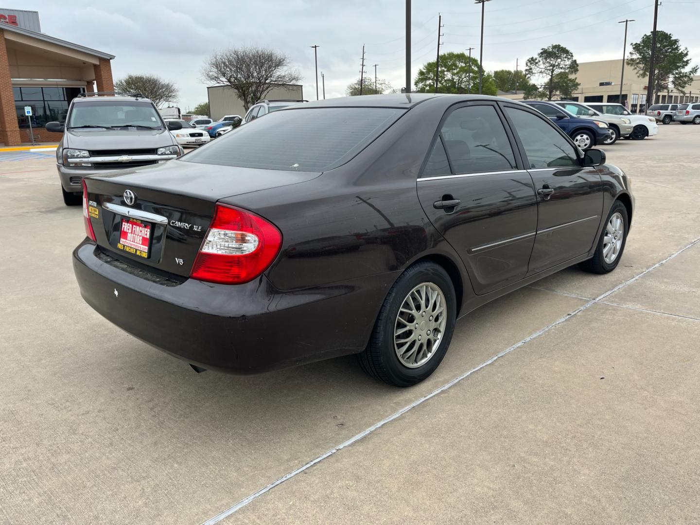 2002 BROWN /tan Toyota Camry LE V6 (JTDBF32K420) with an 3.0L V6 DOHC 24V engine, 4-Speed Automatic Overdrive transmission, located at 14700 Tomball Parkway 249, Houston, TX, 77086, (281) 444-2200, 29.928619, -95.504074 - Photo#6